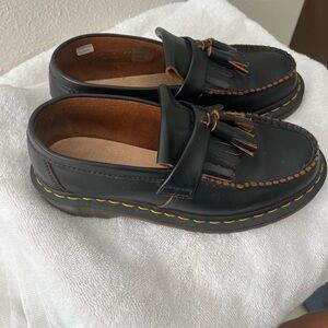 Excellent condition Doc Marten Loafers.  Made in England.  Women’s 9/Mens 8.